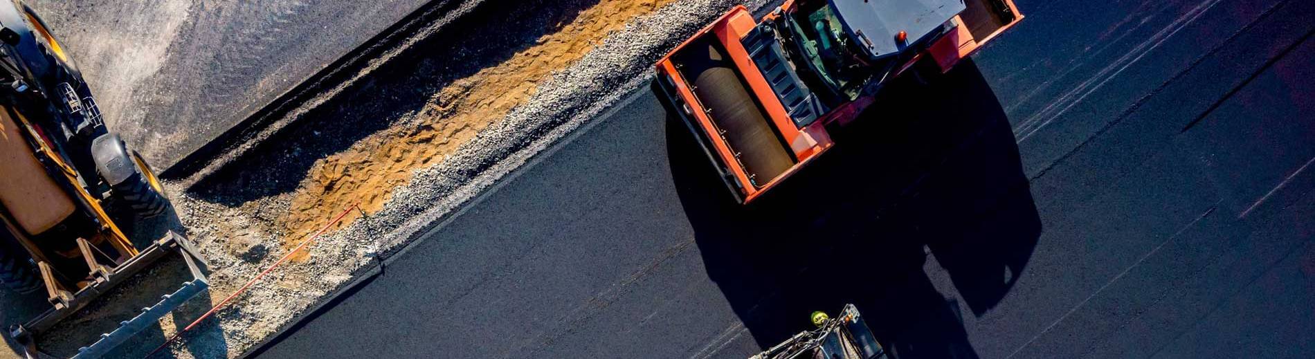 Aerial view of a construction site featuring a truck